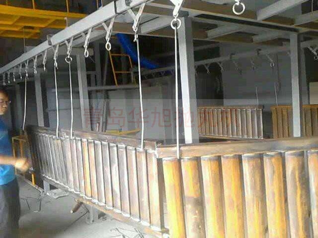 吊掛式拋丸機(jī)清理暖氣片 吊掛式拋丸機(jī)清理暖氣片